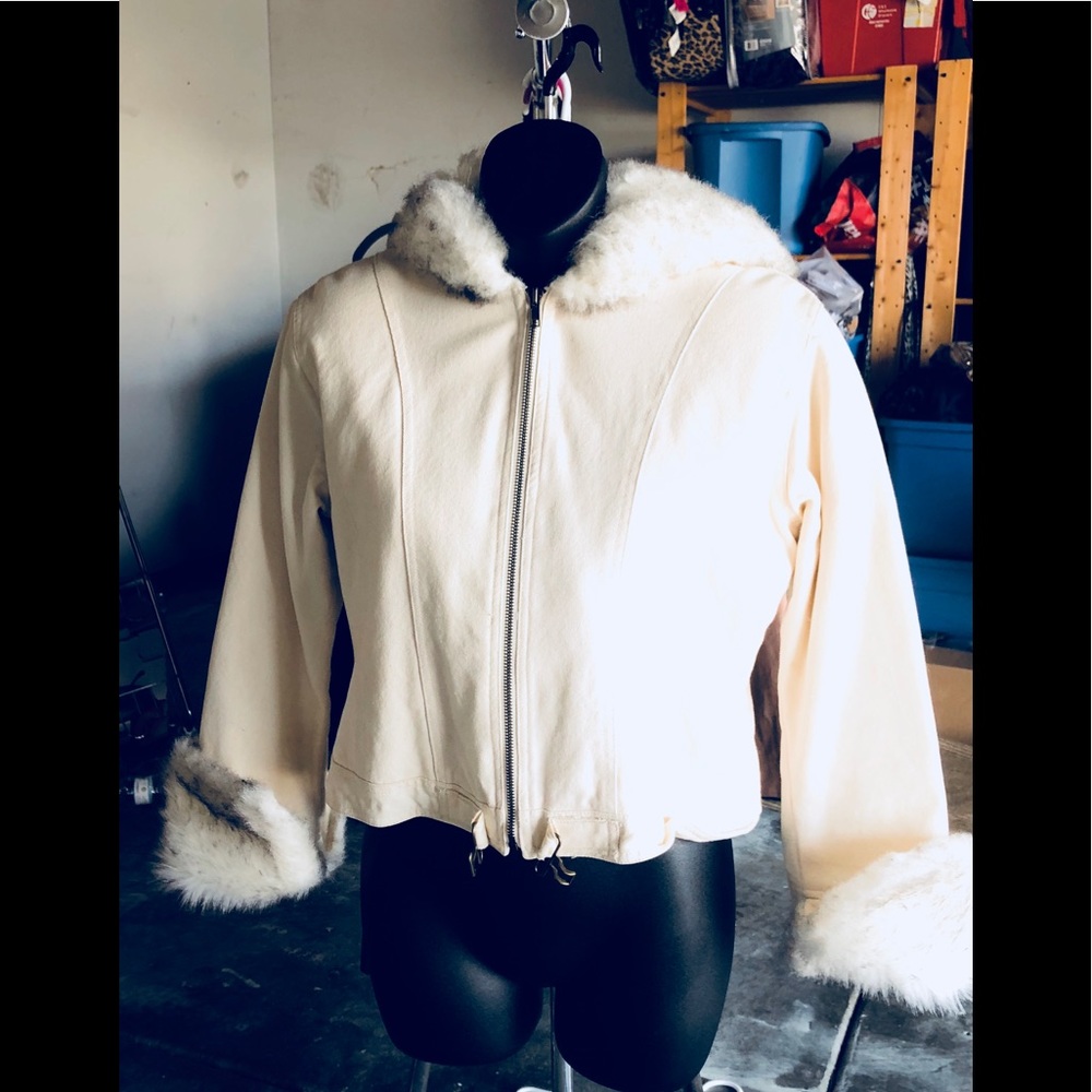 White jacket with fur on sleeves and on hood